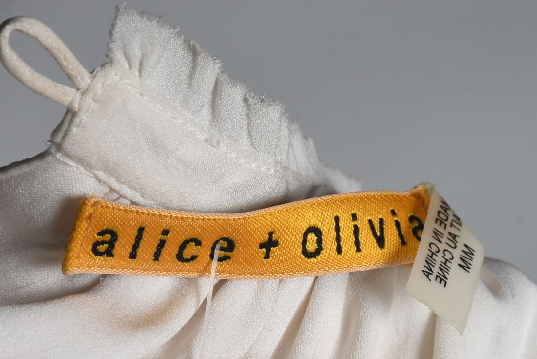 Alice & Olive Ivory Silk Sleeveless Tunic Embellished with Hand Set Crystal Rhinestones