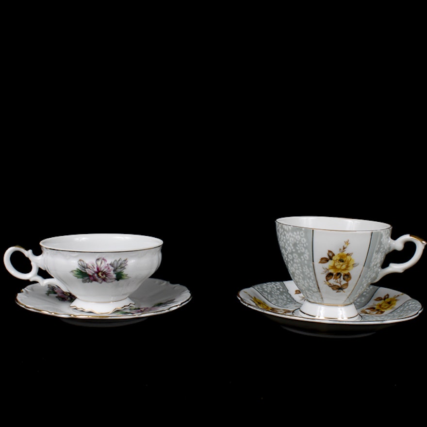 Two Lovely Porcelain Tea Cups With Saucers