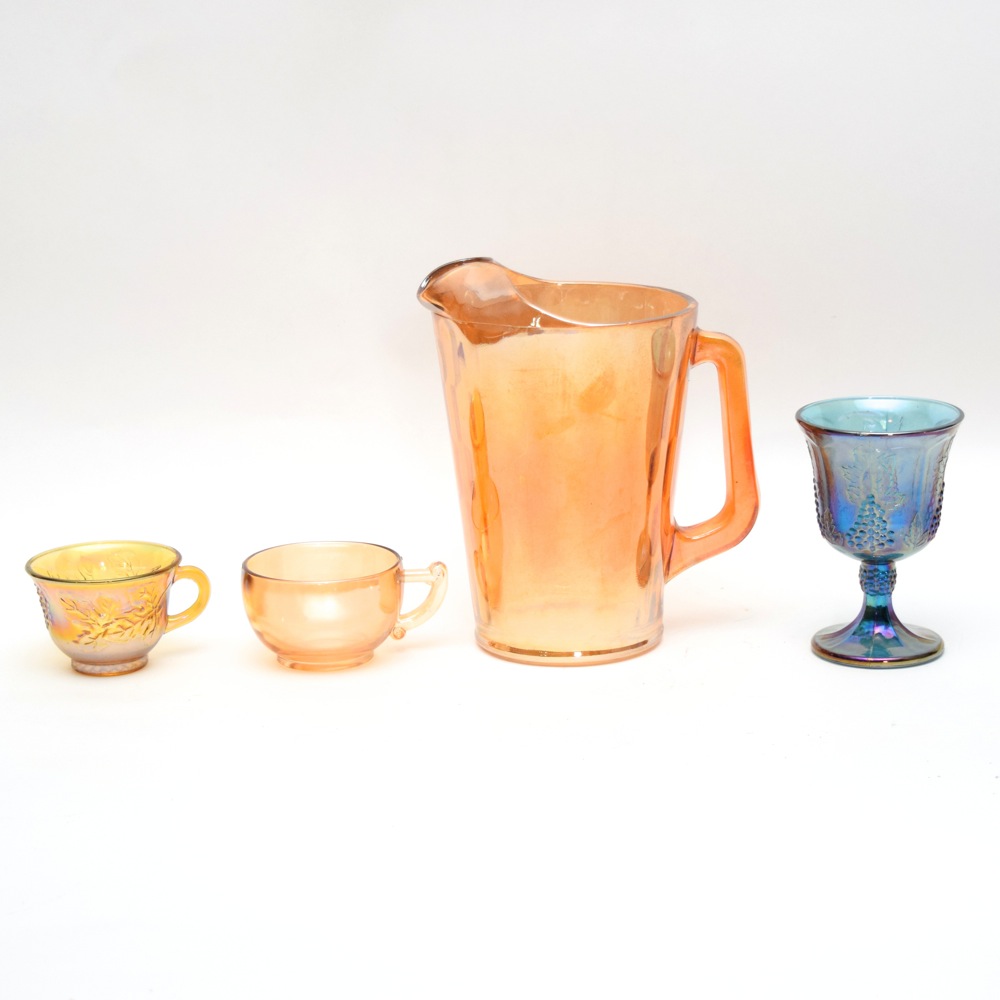 Marigold Carnival Glass Pitcher, Cups and Iridescent Grape Leaf Goblet