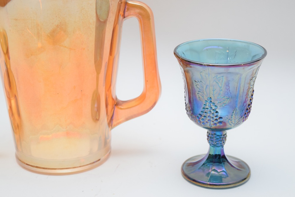Marigold Carnival Glass Pitcher, Cups and Iridescent Grape Leaf Goblet