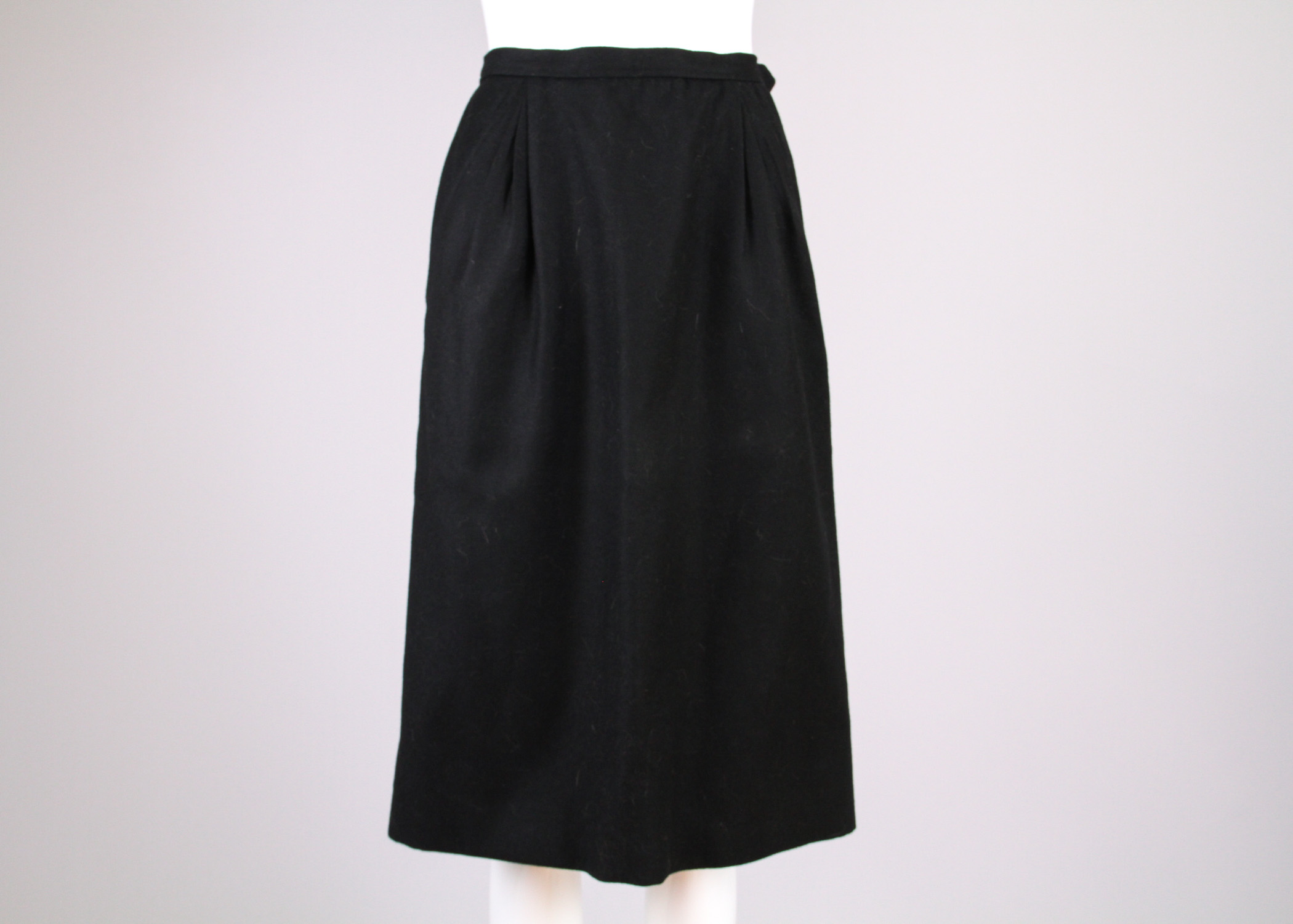 Six Vintage Chanel and Yves Saint Laurent Pencil Skirts