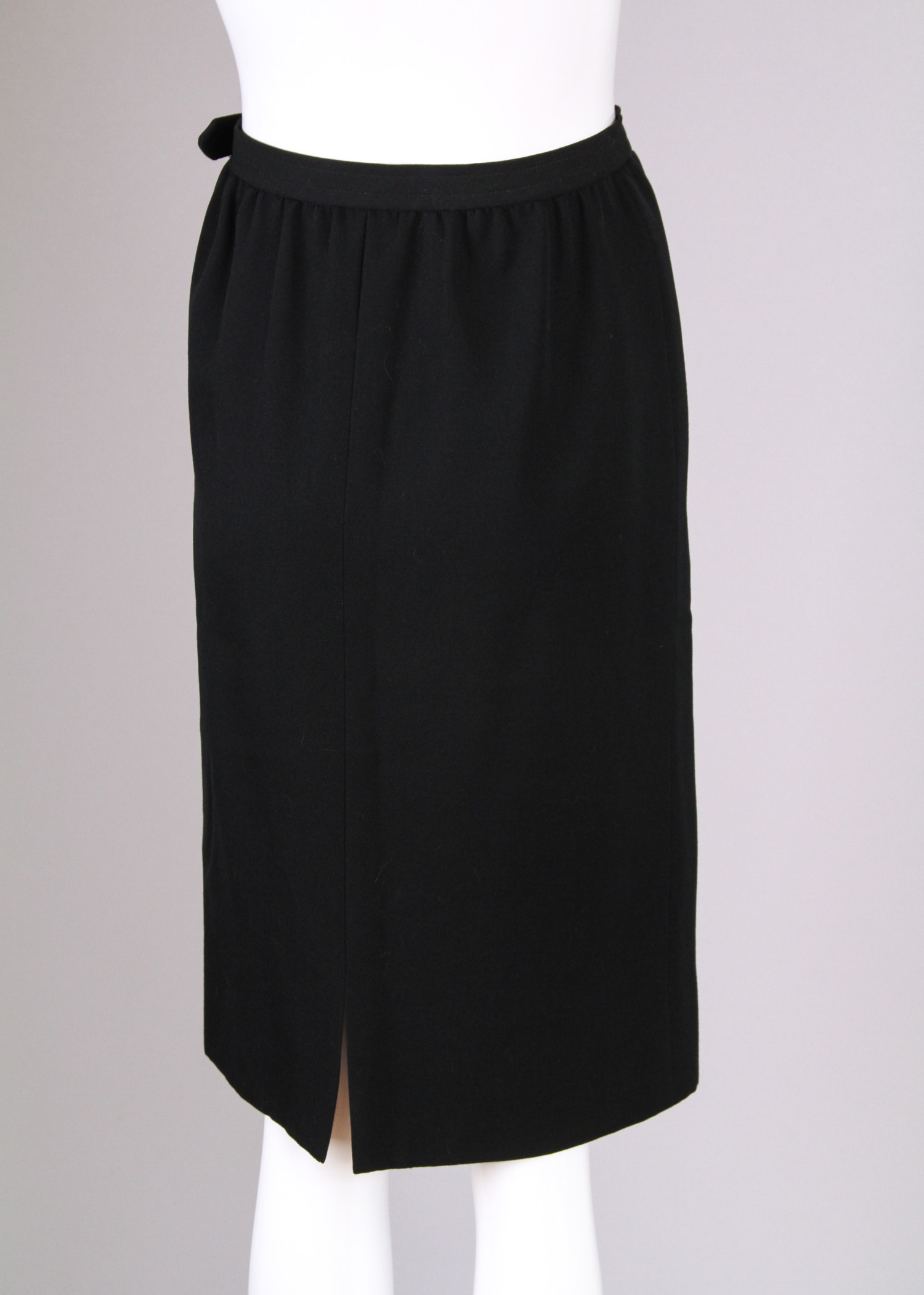 Six Vintage Chanel and Yves Saint Laurent Pencil Skirts