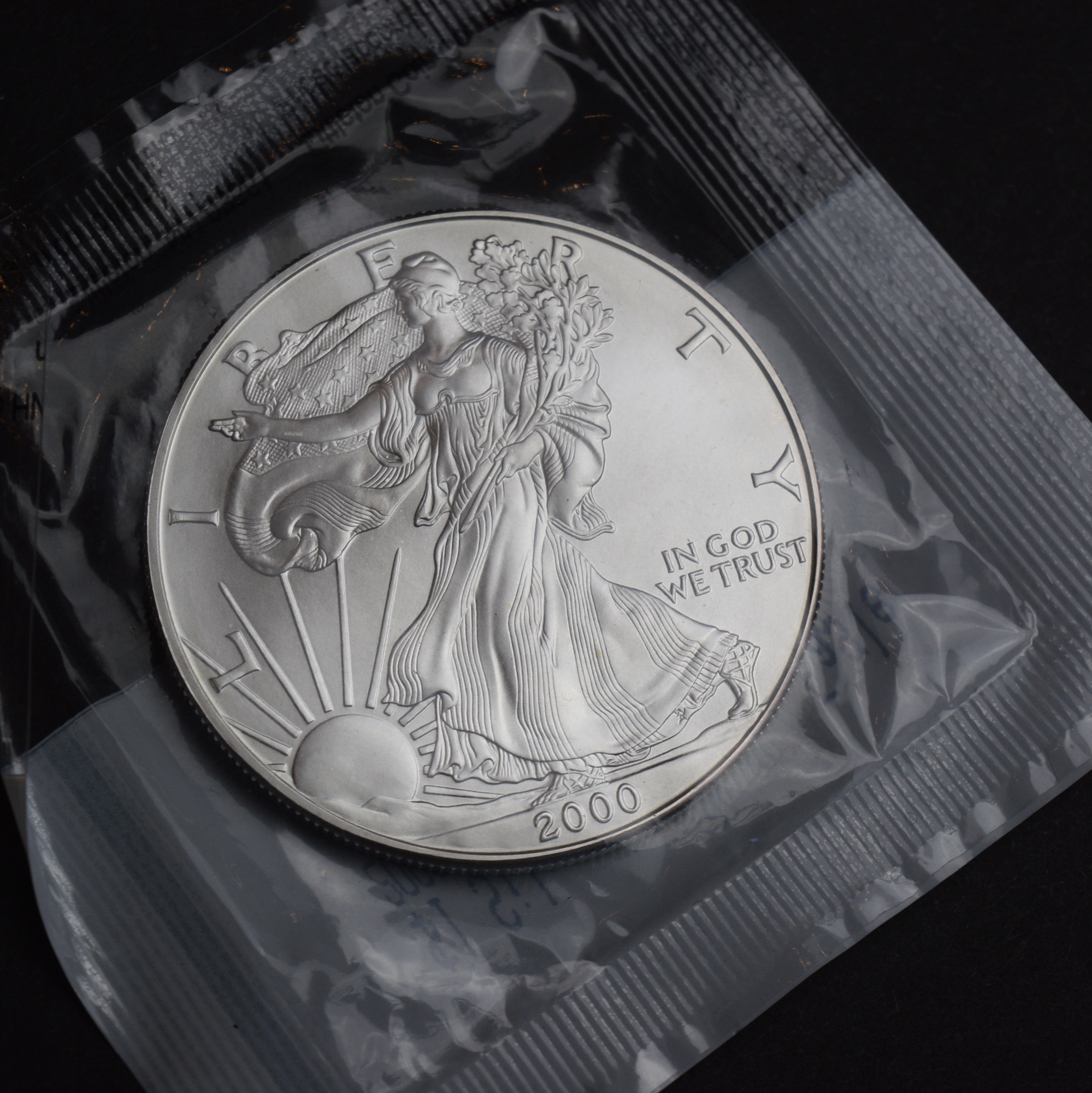 2000 P Walking Liberty Dollar and 1985 Life Liberty Happiness Silver Coin