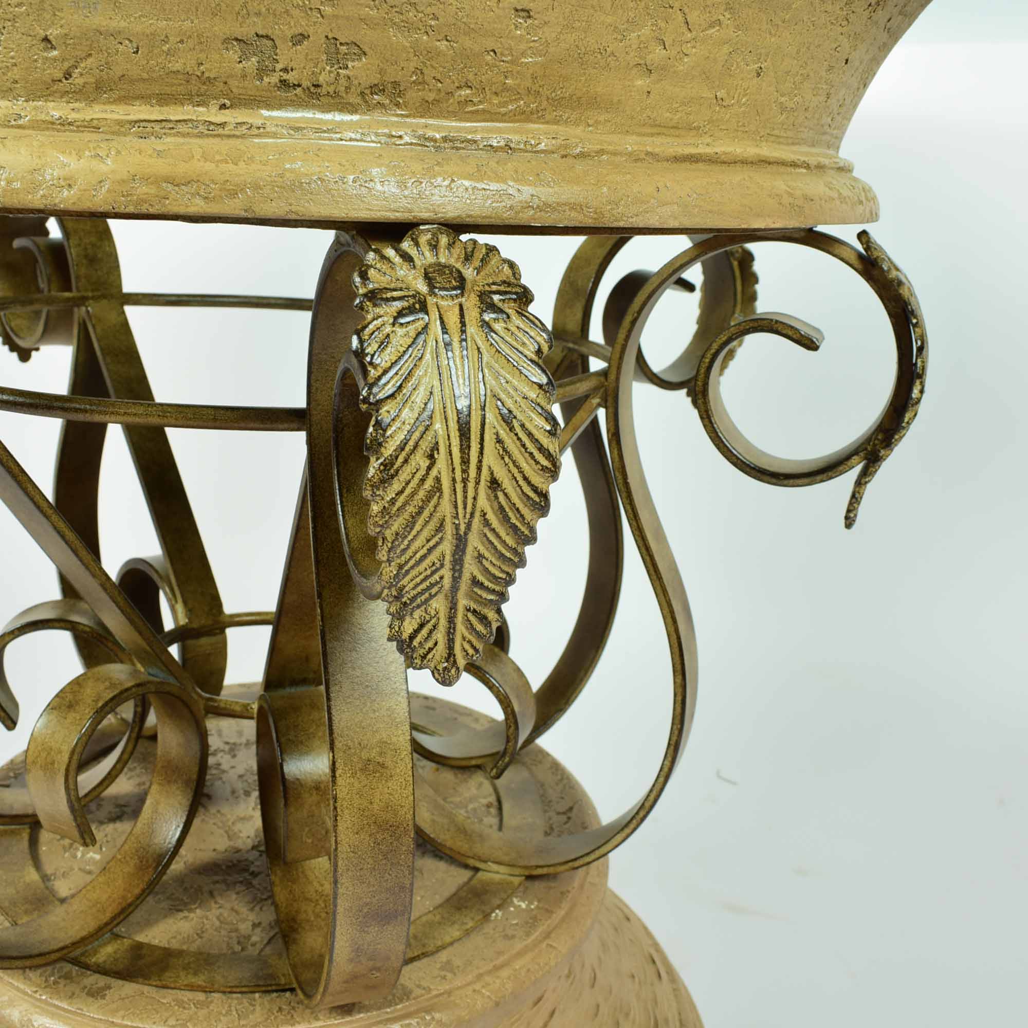 Round Glass Top Table with Ornate Metal and Resin Base
