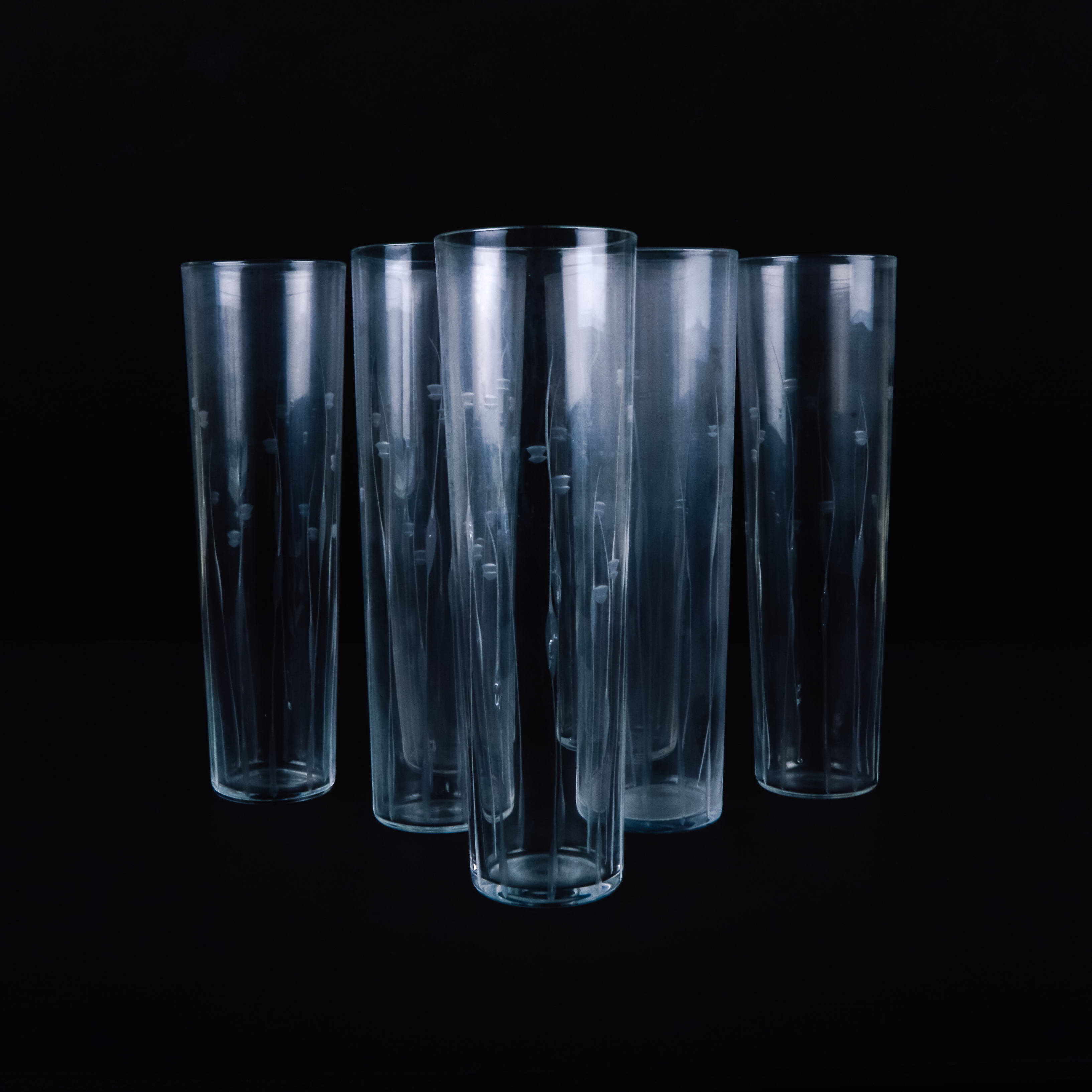 Set of Seven Etched Stemless Champagne Flutes