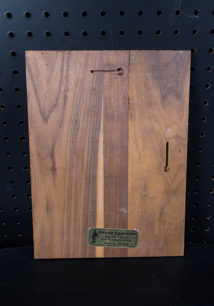 Ed Arno Pen Sketch on Plaque behind Raised Glass