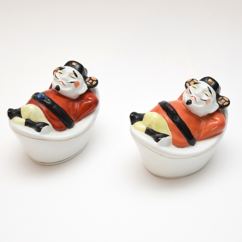 Pair of Porcelain Asian Inspired Men At Rest Figurines