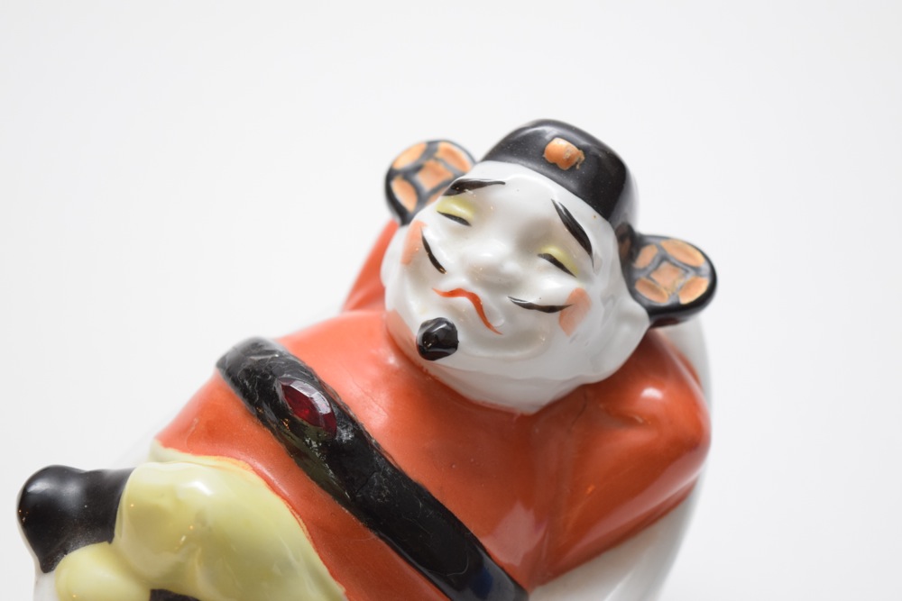 Pair of Porcelain Asian Inspired Men At Rest Figurines