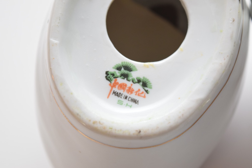 Pair of Porcelain Asian Inspired Men At Rest Figurines