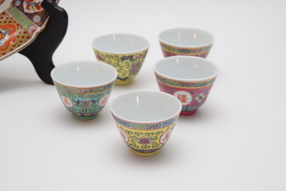 Pair of Asian Inspired Porcelain Bowls and Four Sake Cups
