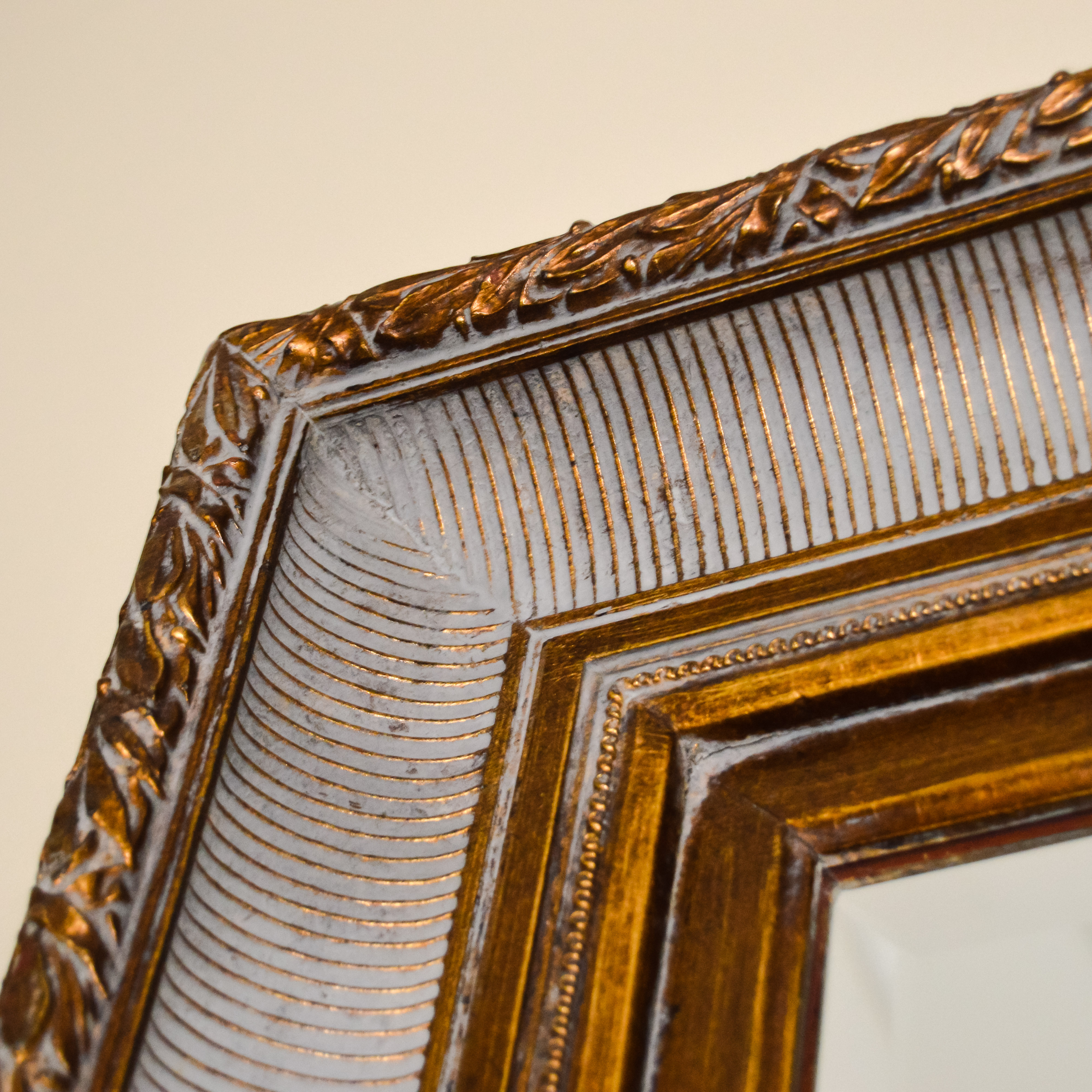 Hanging Mirror in Gold-Tone Antiqued Frame
