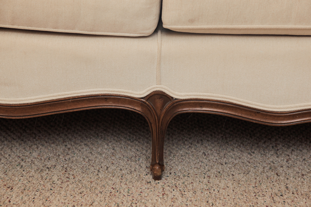 Upholstered Camel Back Sofa