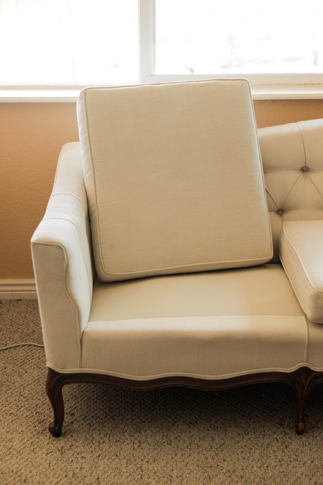 Upholstered Camel Back Sofa