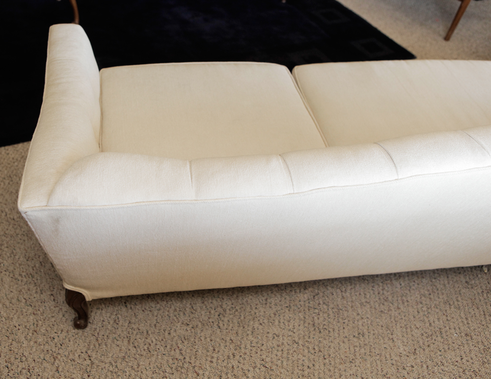 Upholstered Camel Back Sofa