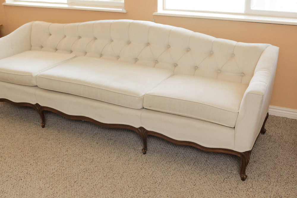 Upholstered Camel Back Sofa