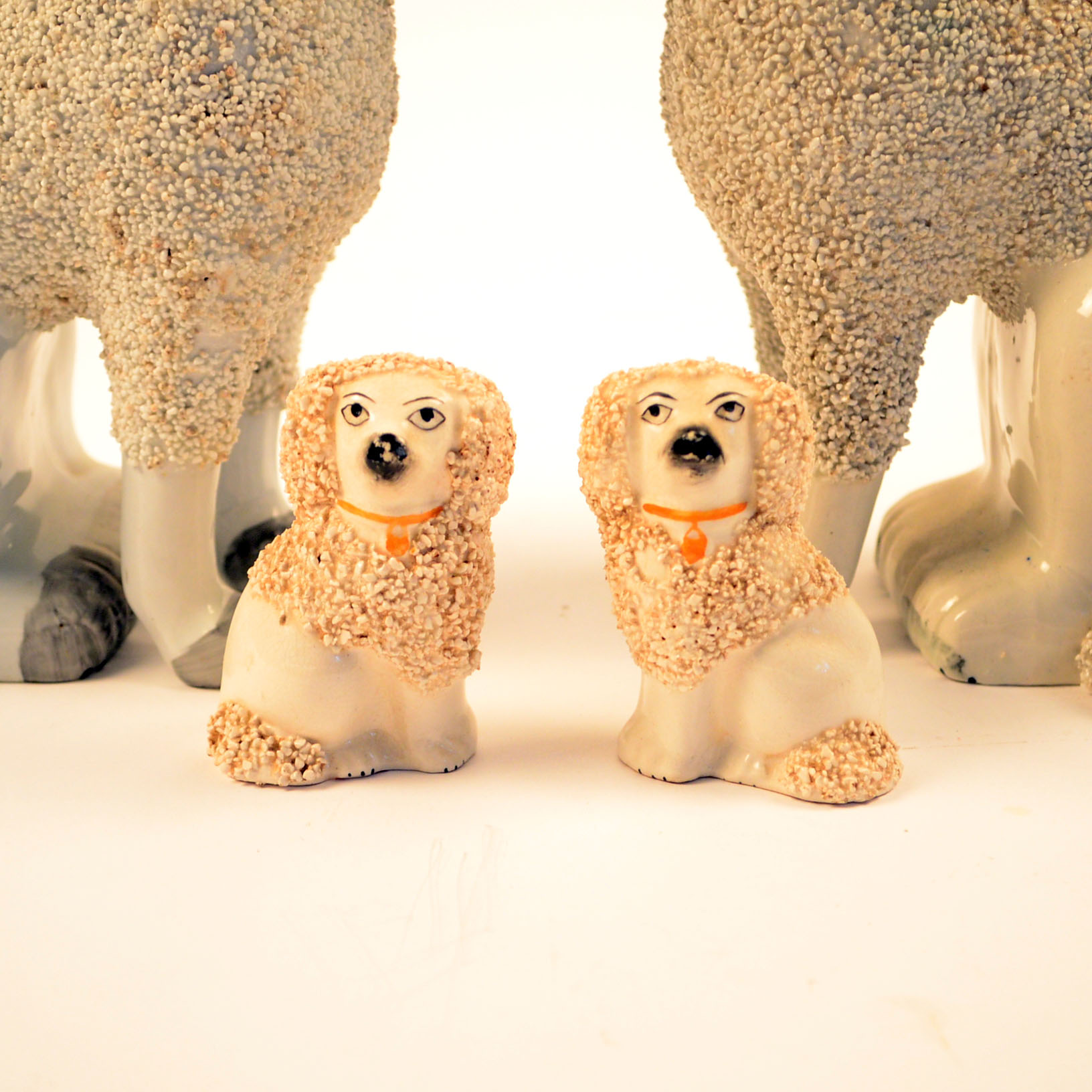 Set of Four Antique Staffordshire Poodle Figurines