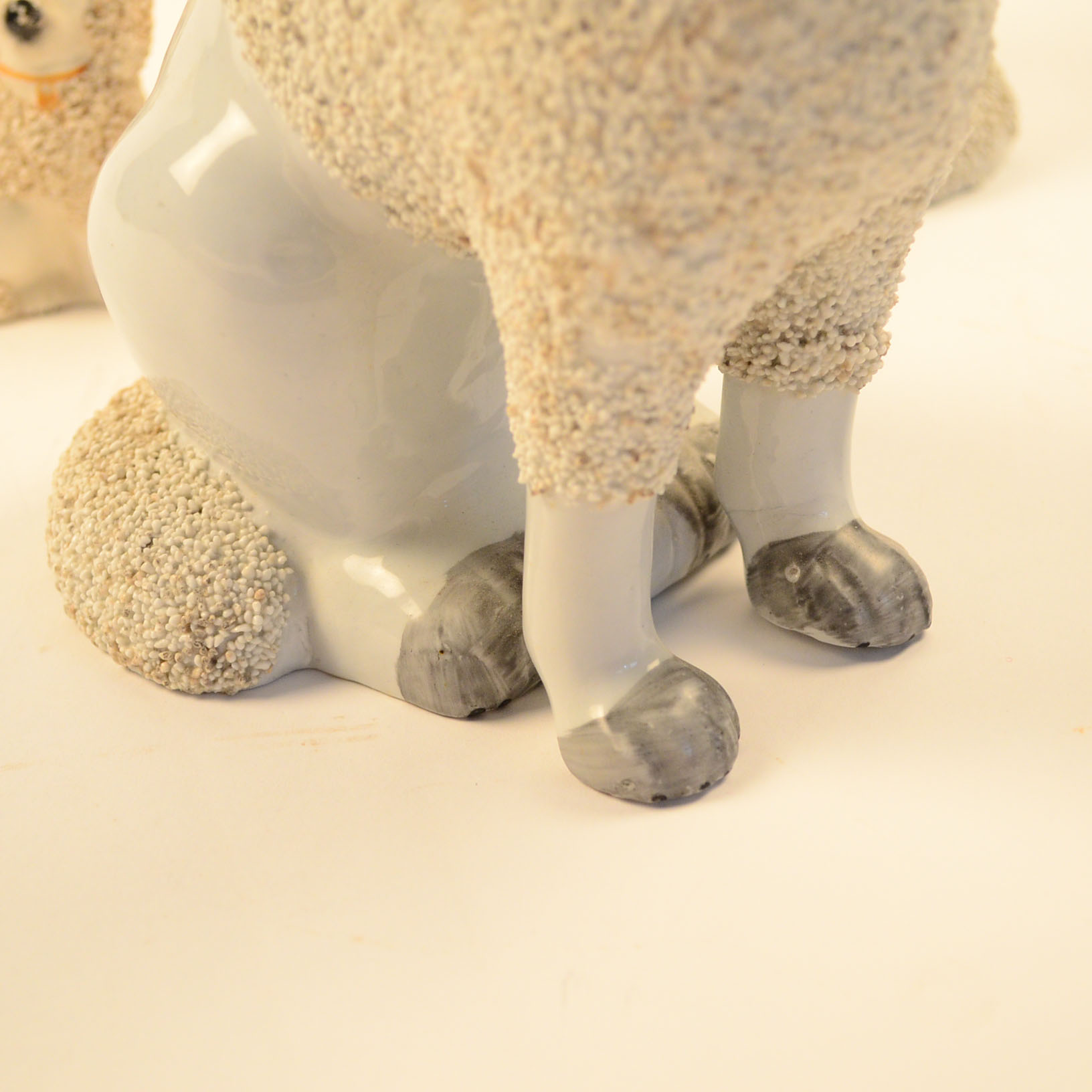 Set of Four Antique Staffordshire Poodle Figurines