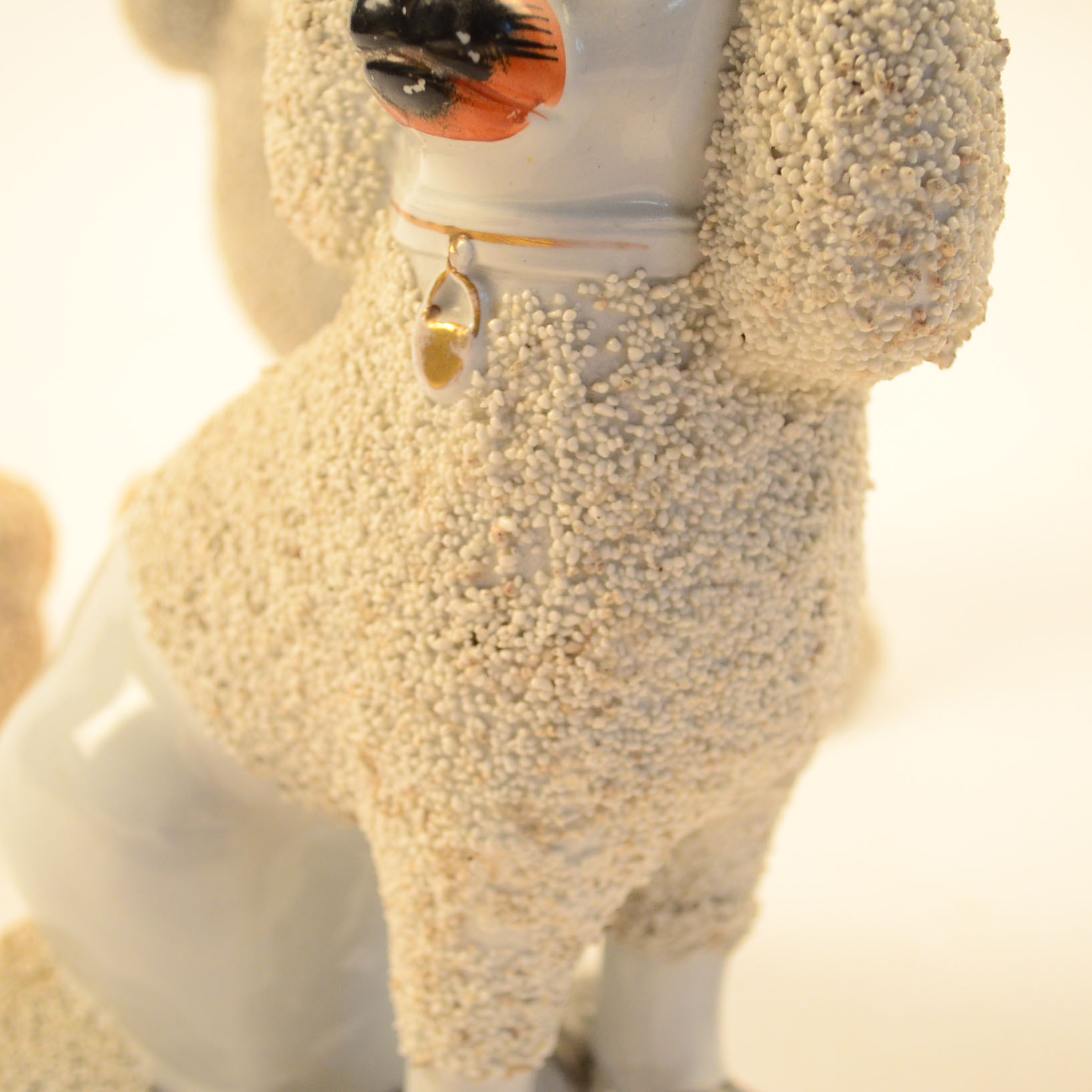 Set of Four Antique Staffordshire Poodle Figurines