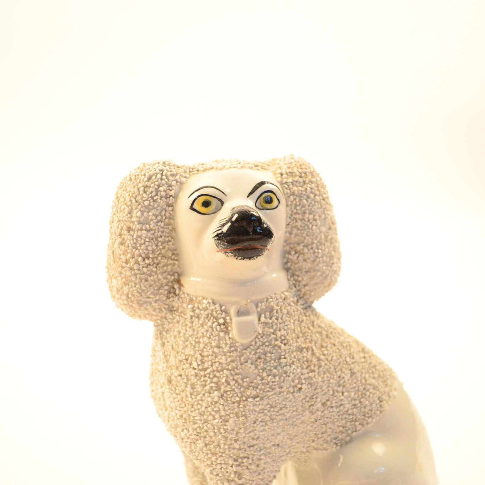 Set of Four Antique Staffordshire Poodle Figurines