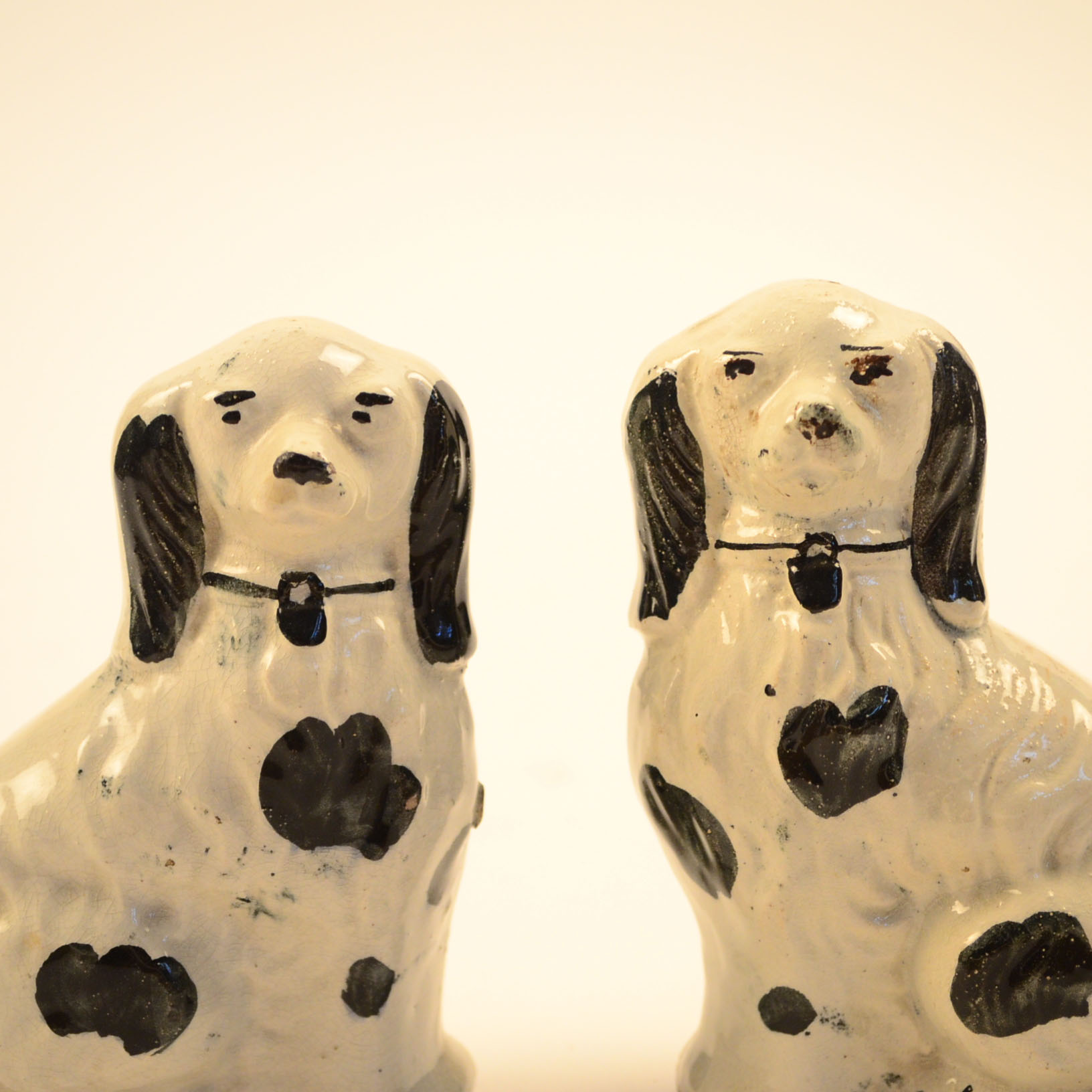 Two Reproduction Staffordshire Dog Figurines