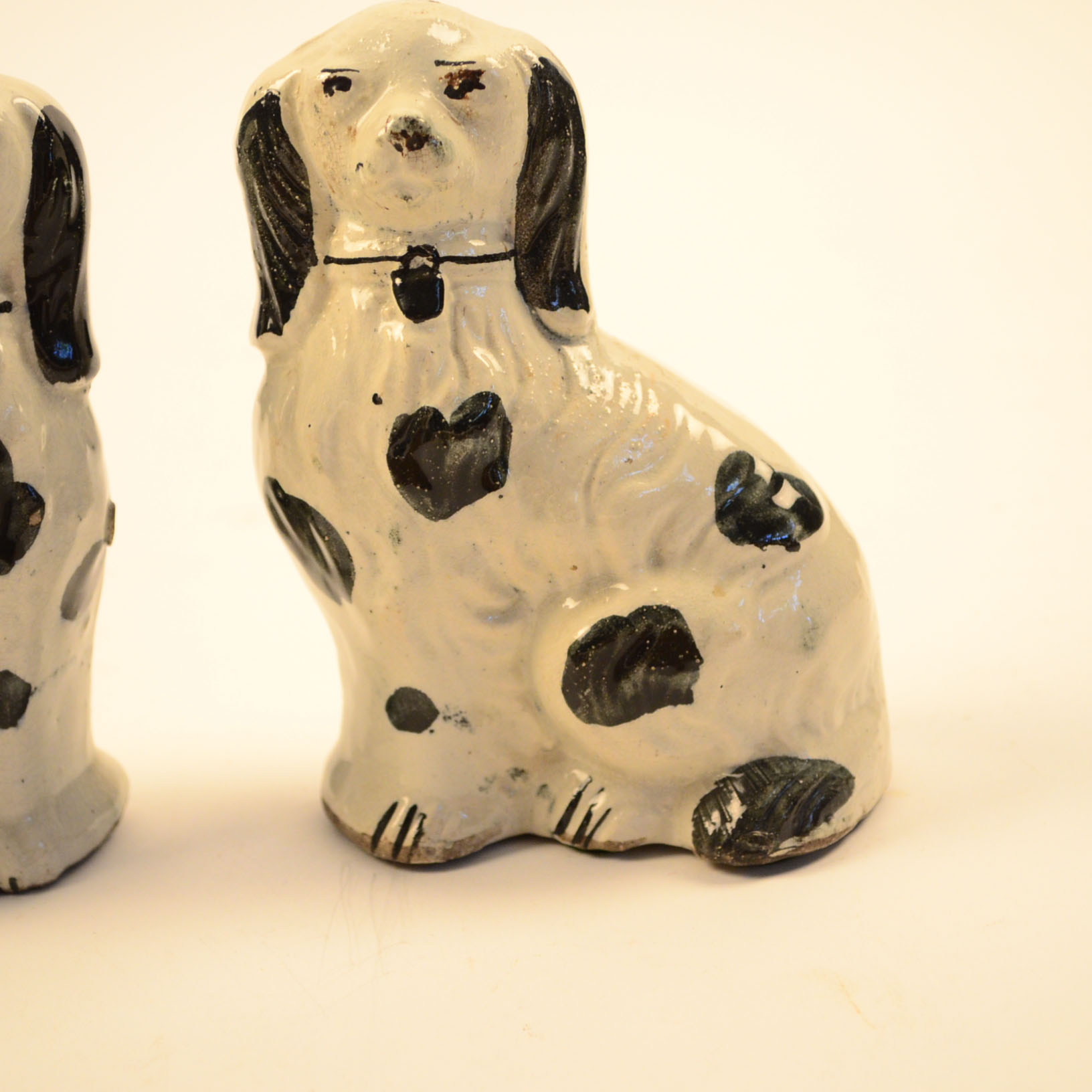 Two Reproduction Staffordshire Dog Figurines