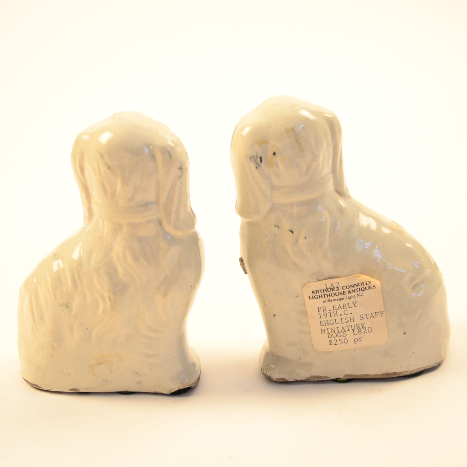Two Reproduction Staffordshire Dog Figurines