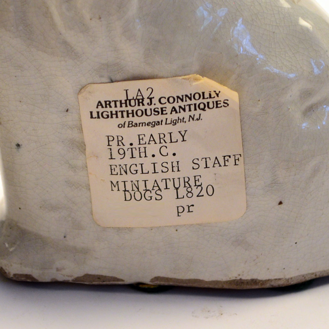 Two Reproduction Staffordshire Dog Figurines