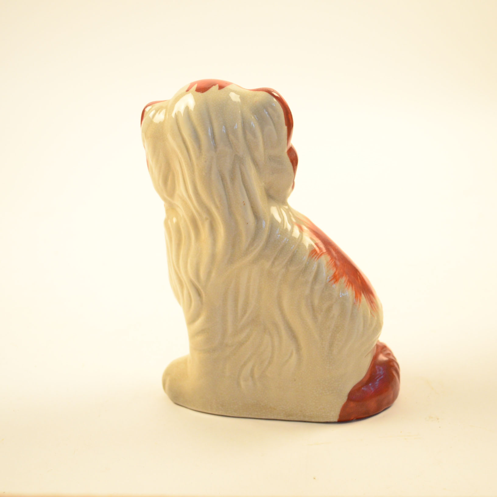 Four Antique and Reproduction Staffordshire Dog Figurines