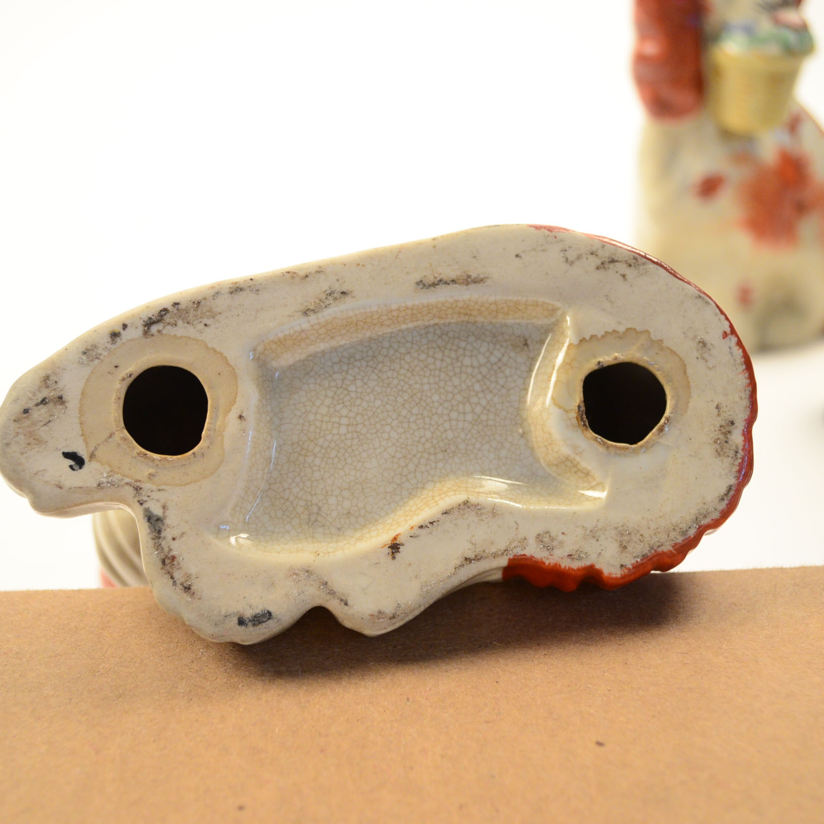 Four Antique and Reproduction Staffordshire Dog Figurines