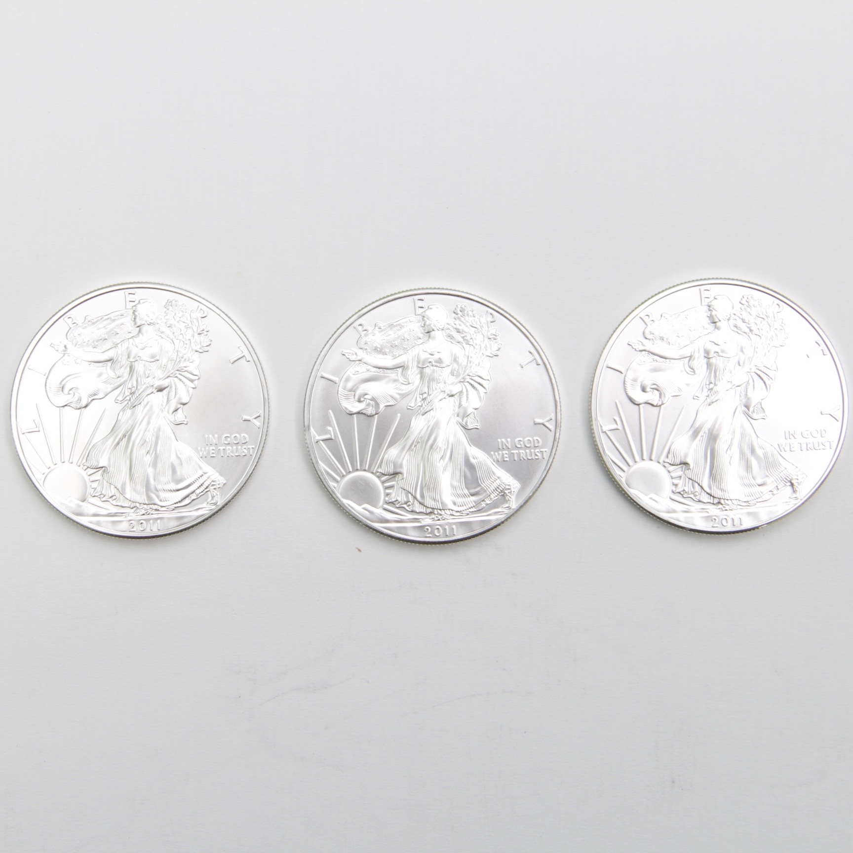 Three 2011 U.S. One Dollar Fine Silver Eagle Coins
