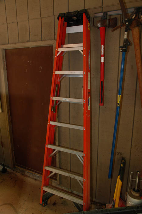 Ladder and Assortment of Garden Tools