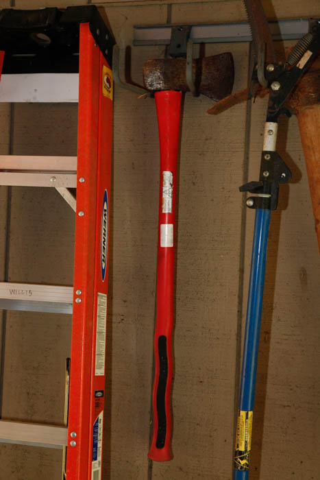 Ladder and Assortment of Garden Tools