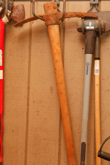 Ladder and Assortment of Garden Tools