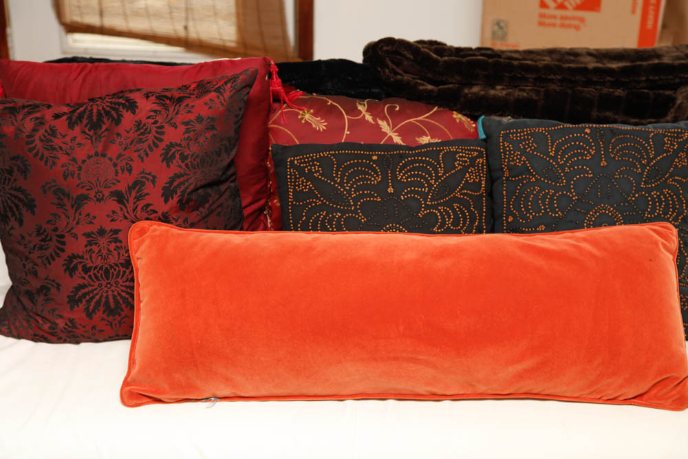 Grouping of Decorative Pillows and Throws