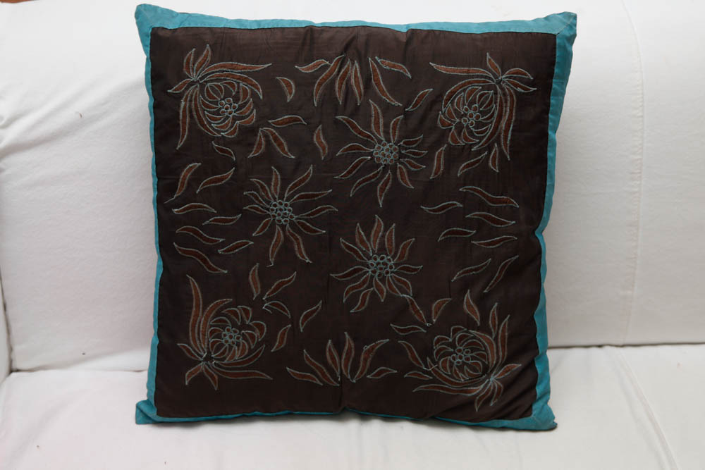 Grouping of Decorative Pillows and Throws