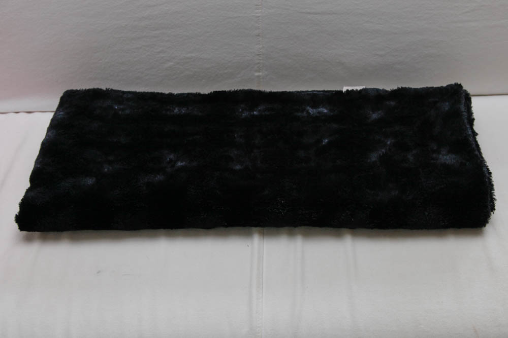 Grouping of Decorative Pillows and Throws