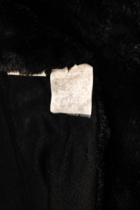 Grouping of Decorative Pillows and Throws