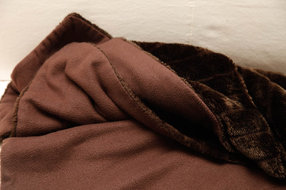 Grouping of Decorative Pillows and Throws