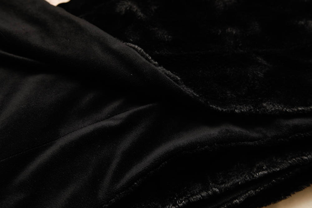 Grouping of Decorative Pillows and Throws