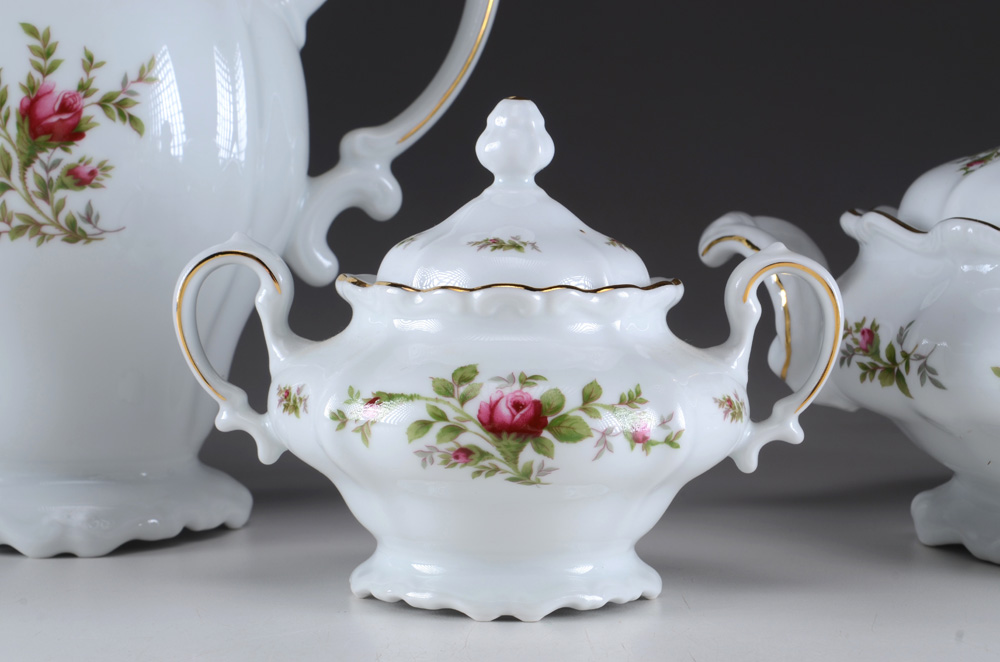 Large Partial Set of Johann Haviland "Moss Rose" China