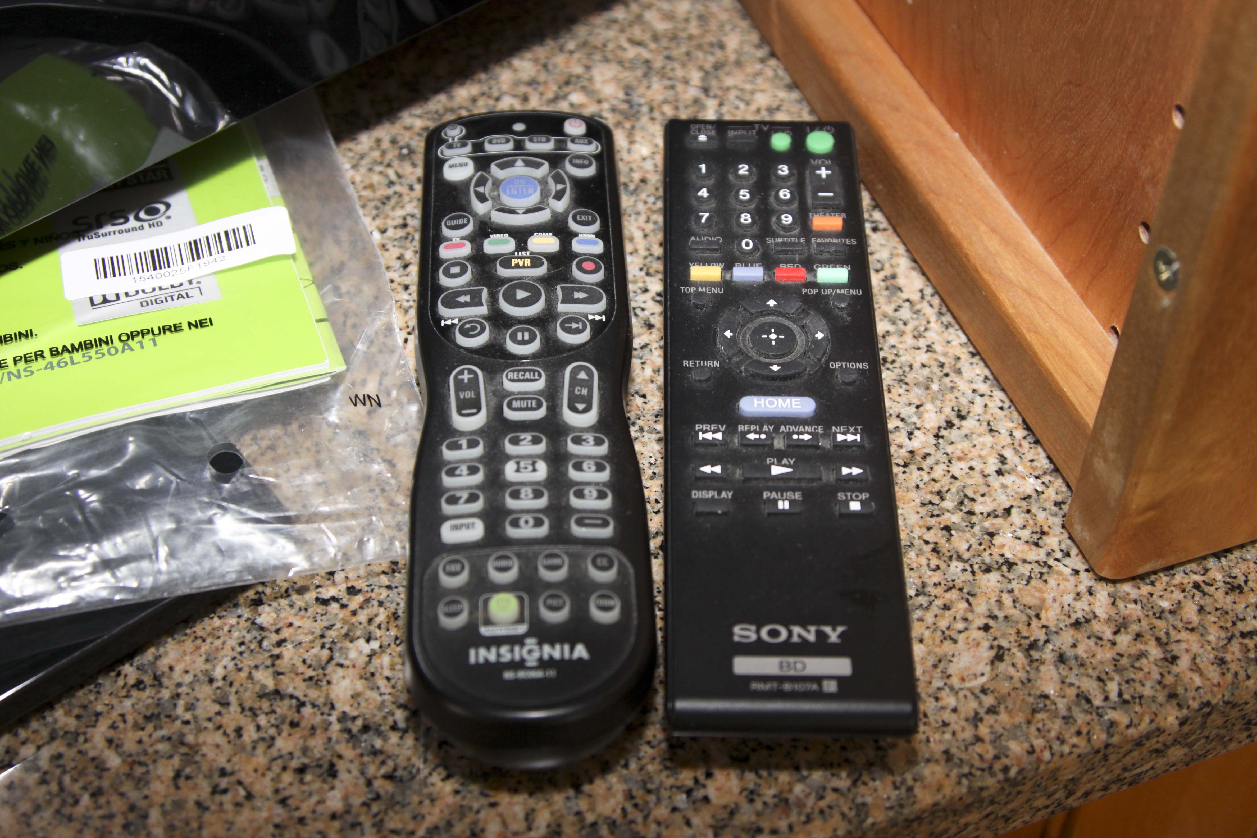 Insignia Flat Screen Television with Sony Blue Ray DVD Player and Collection of DVDs