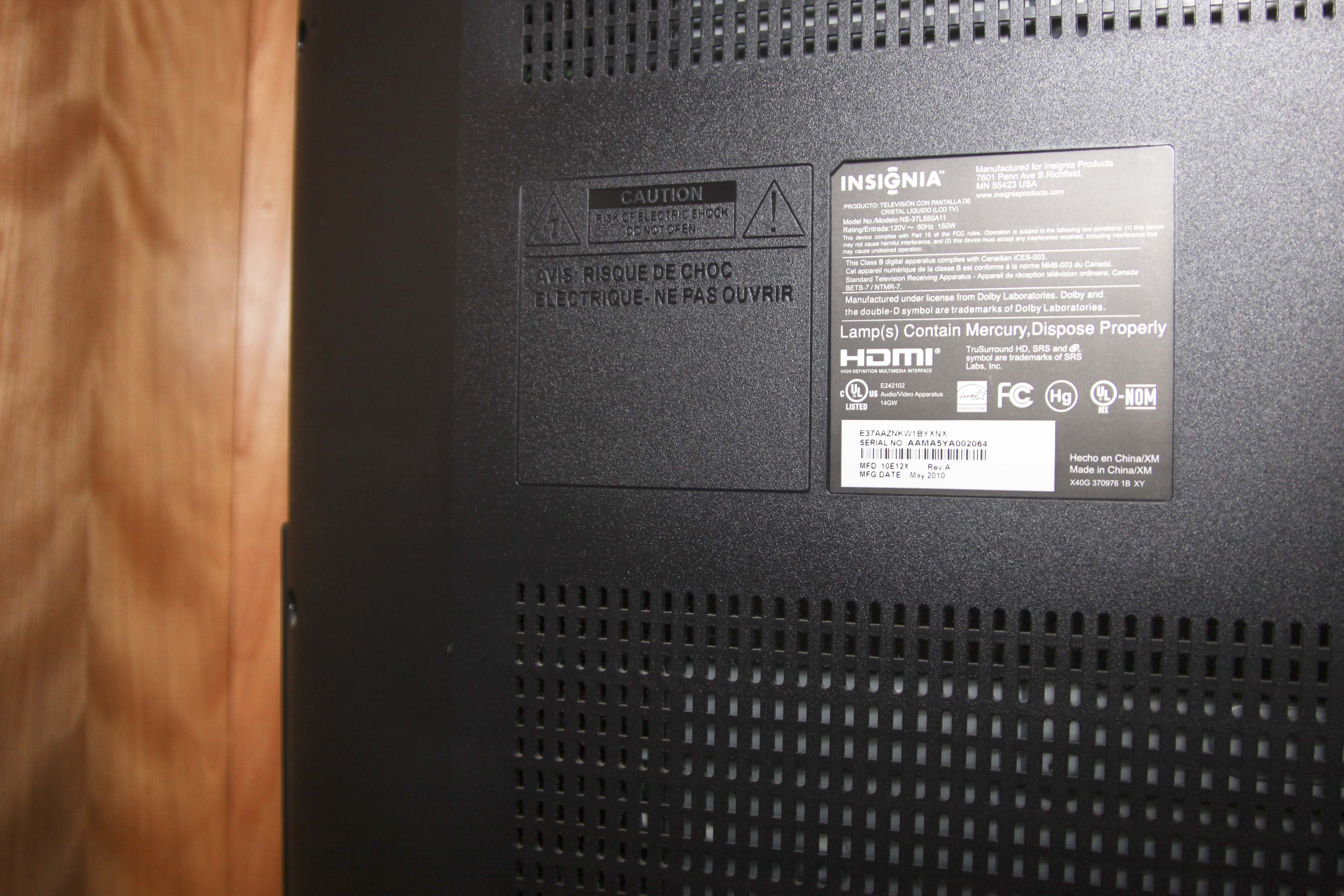 Insignia Flat Screen Television with Sony Blue Ray DVD Player and Collection of DVDs