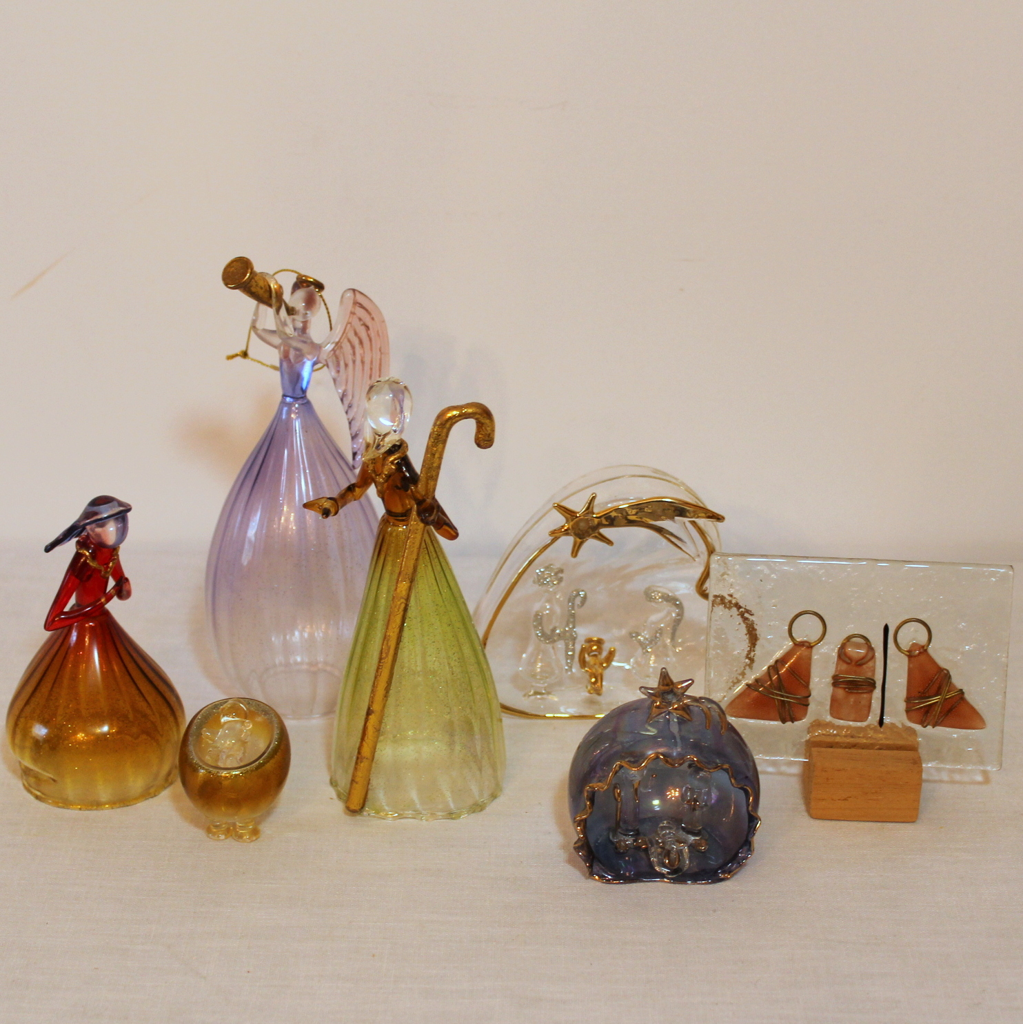 Nativity Scenes In Glass and Iridescent Plastic