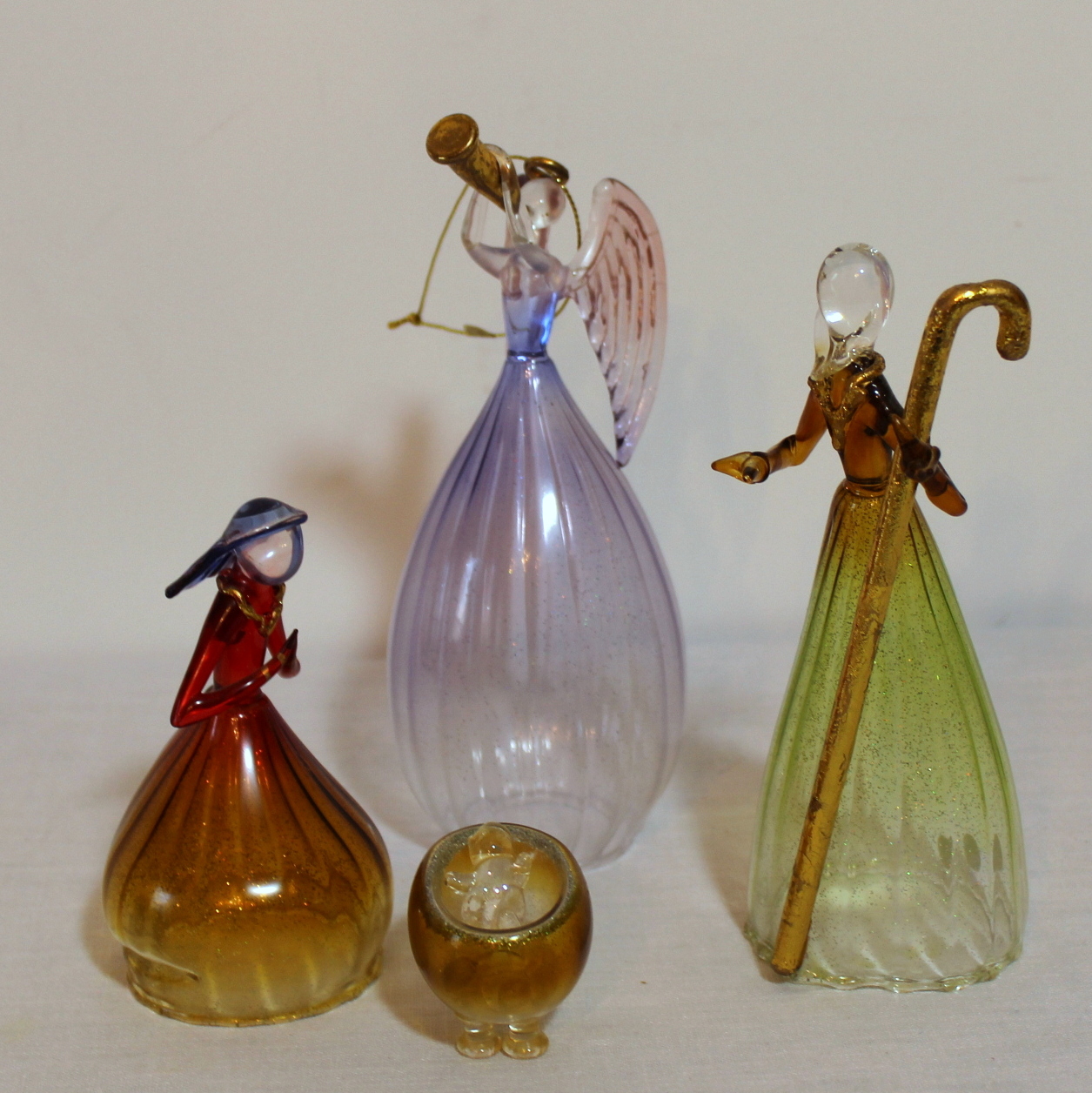Nativity Scenes In Glass and Iridescent Plastic