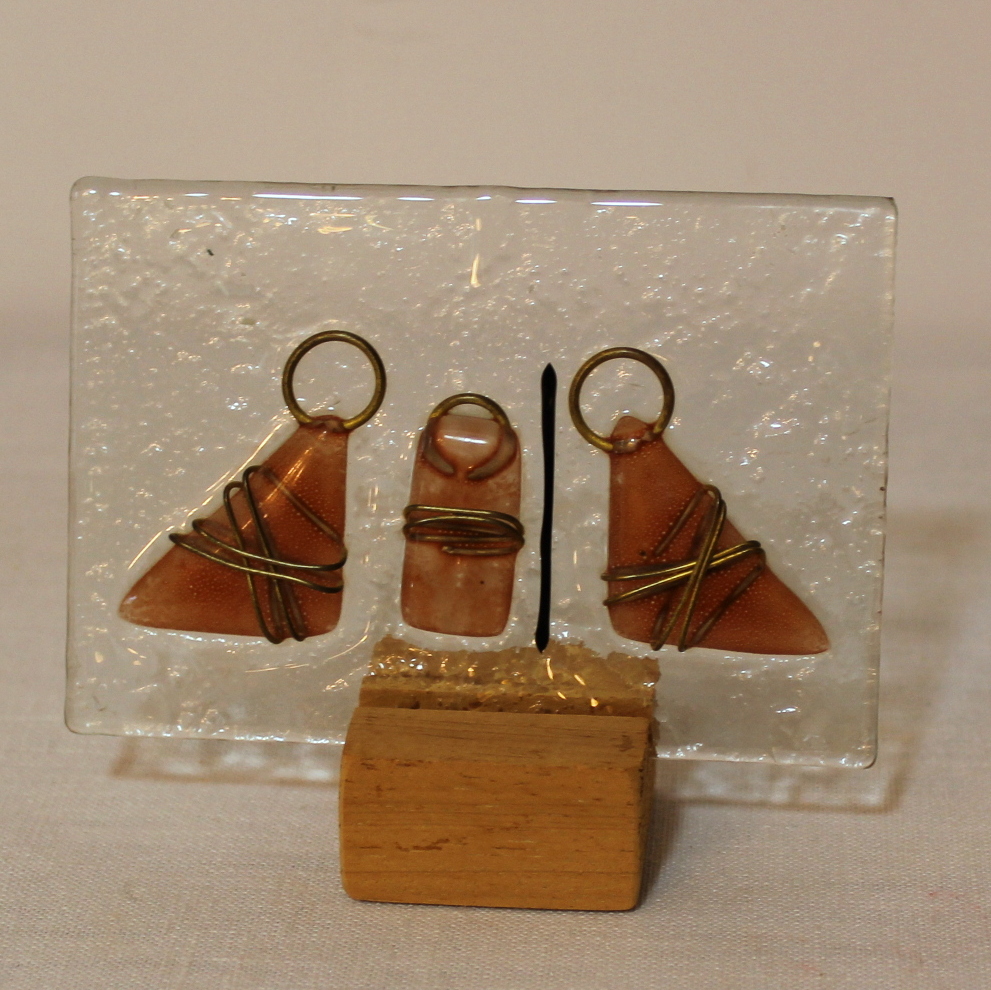 Nativity Scenes In Glass and Iridescent Plastic