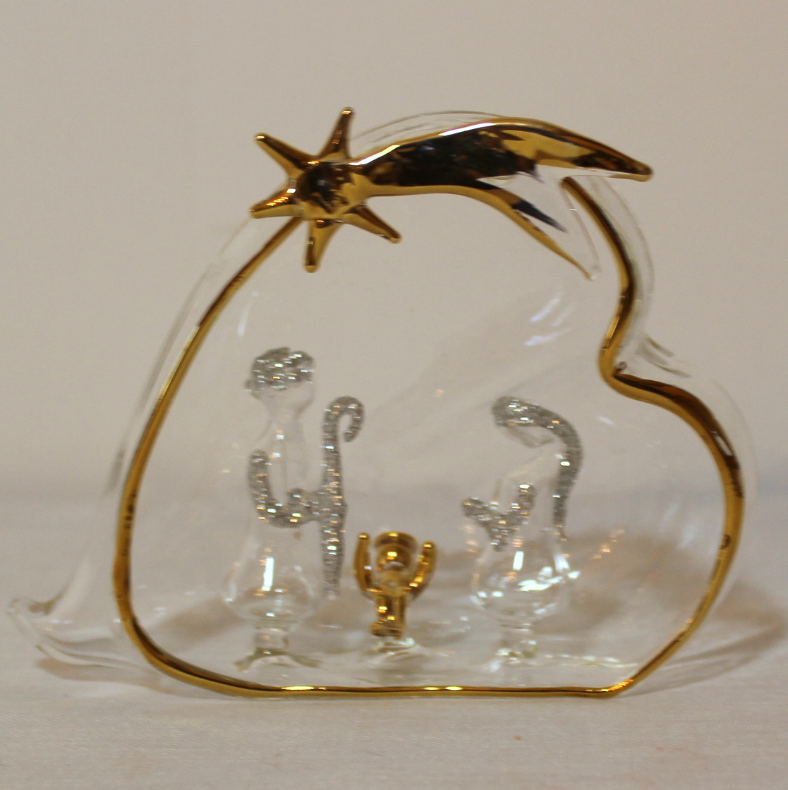 Nativity Scenes In Glass and Iridescent Plastic