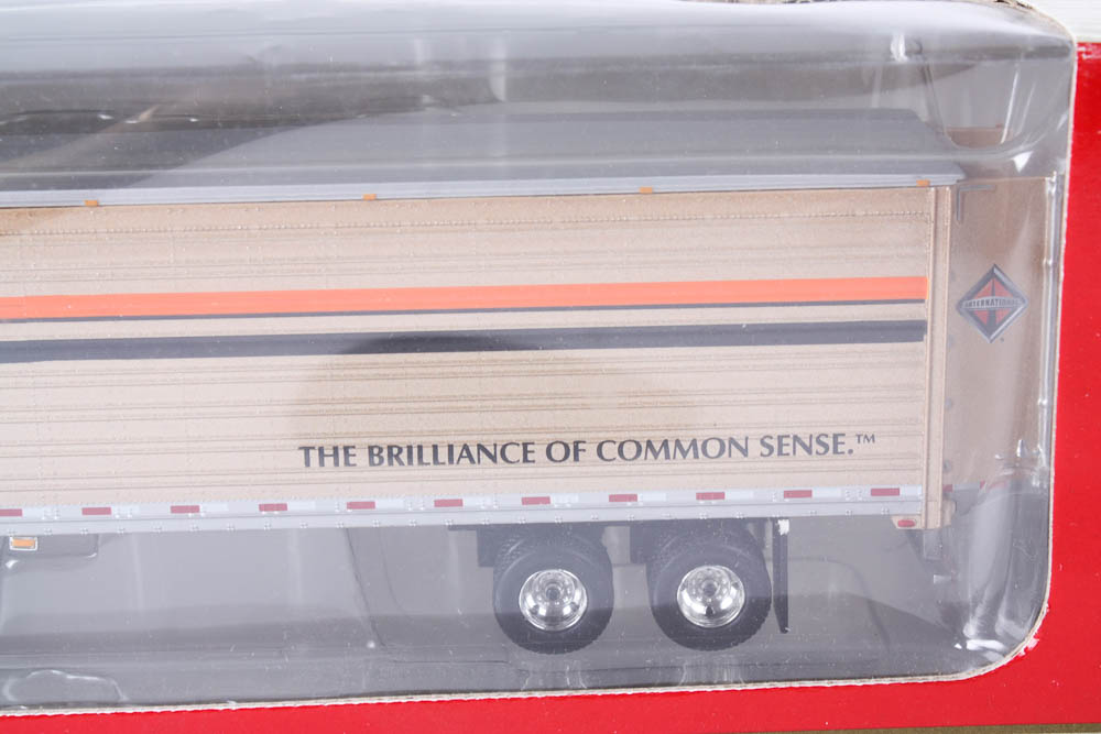 Pair of 1:64 Scale Die-Cast Model Trucks