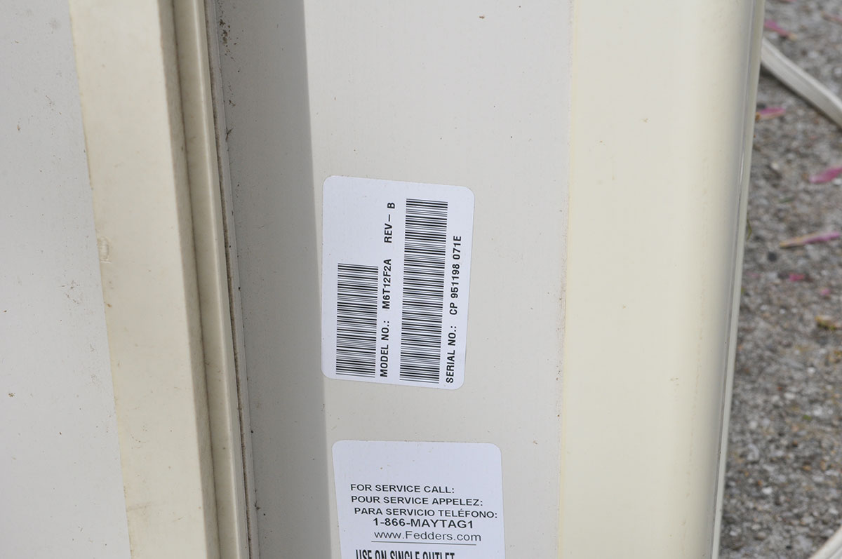 Pair of Window Air Conditioning Units by Kenmore and Maytag