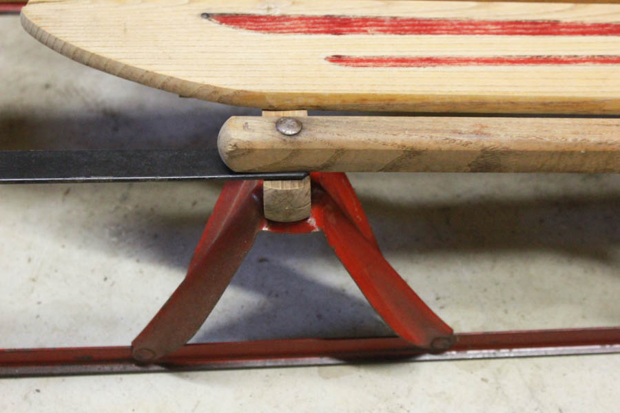 Red Metal and Wood Speedway Sled