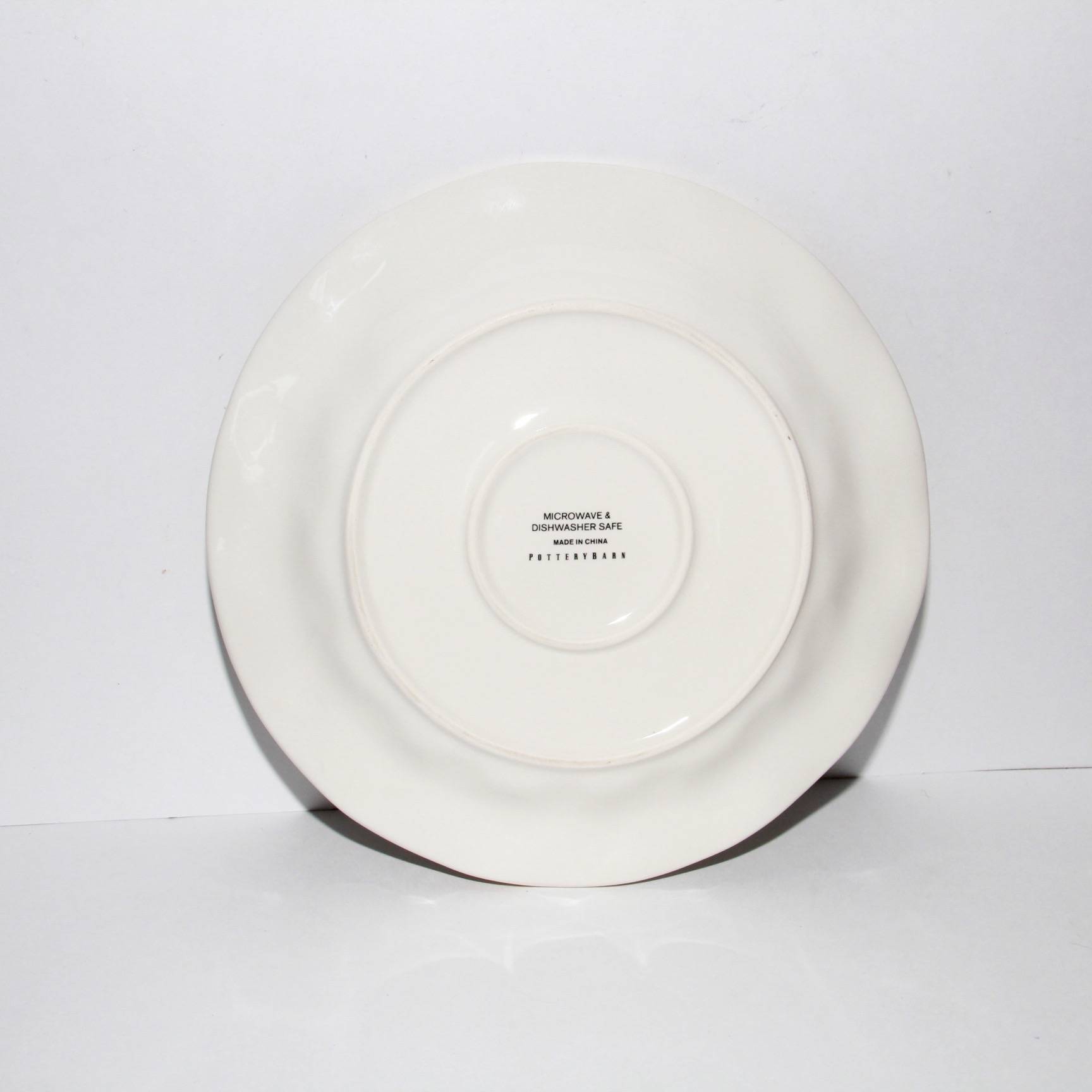 Set of Pottery Barn Ikat Plates